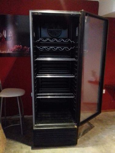 vendo exhibidora vertical negra gafa. casi sin uso. armstrong.